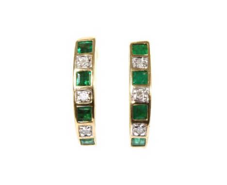 A pair of 9ct gold emerald and diamond 'J' hoop earrings, with alternating square step cut emeralds and eight cut diamonds, r