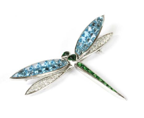 An 18ct white gold diamond and gemstone en tremblant dragonfly brooch, a row of buff top green gemstones channel and rub set 