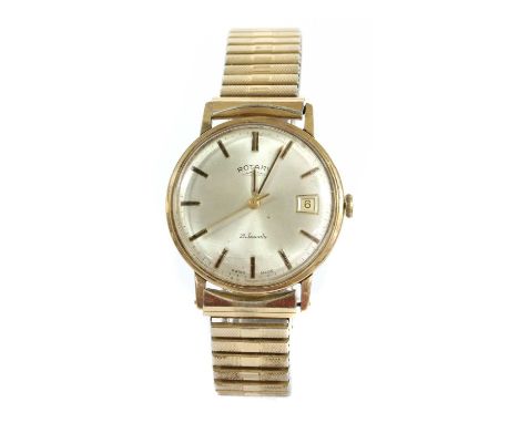 A gentlemen's 9ct gold Rotary mechanical bracelet watch, 35mm diameter with a silvered dial, baton hour markers, date apertur