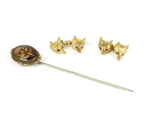 A pair of 9ct gold fox head cufflinks, by Cropp &amp; Farr, two fox heads with ruby set eyes, with chain link fittings, Londo