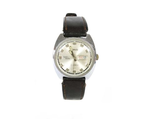 A stainless steel Oris 'Twin Date' mechanical strap watch, c.1970, tonneau shaped case, 36mm diameter with a silvered dial, r