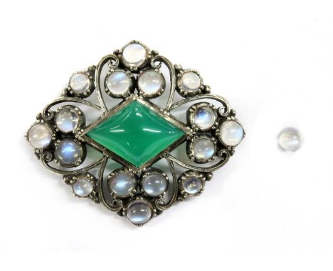 An Arts &amp; Crafts silver dyed green agate and moonstone brooch, attributed to Sybil Dunlop, a lozenge shaped cabochon dyed