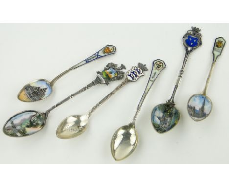 6 silver and enamel souvenir teaspoons.