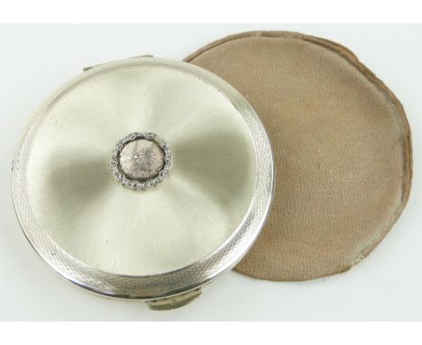 A Kigu circular silver compact,
London 1963.