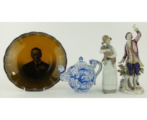 Sitzendorf figure,
height 10.75", Lladro figure, teapot and plate, (4).