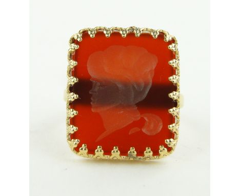 A Cameo seal ring,
unmarked gilt metal settings, panel height 18mm.