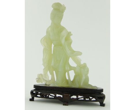 Oriental carved jade figure with a dog,
on carved plinth, height 8.25" overall.