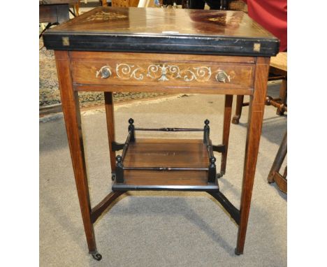 A late Victorian rosewood envelope card table,
having a single frieze drawer with a raised under tier on square tapered legs,