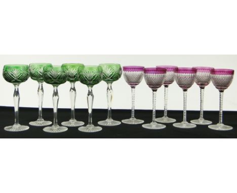 A set of 6 green overlay hock glasses,
8" and a set of 6 ruby overlay crystal glasses.