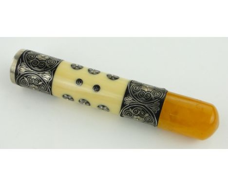 An unusual amber, ivory and silver cigar holder/stick handle,
with silver pique inlay in original leather case, length 11cm.