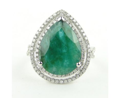 14ct white gold emerald and diamond cluster ring,
setting height 20mm, size M.