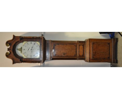 An 18th century 8-day long case clock,
having a 13" arch top painted enamel dial with 2 subsidiary dials, in an oak and mahog