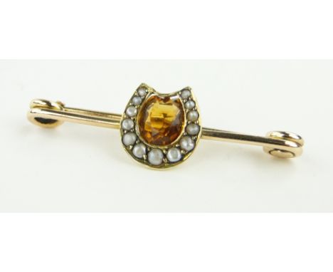 9ct gold citrine and seed pearl horseshoe design brooch, length 38mm.