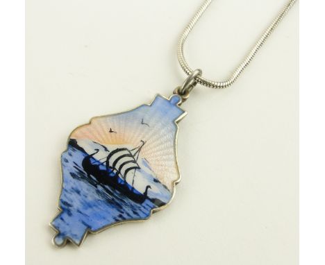 Swedish silver and painted enamel pendant and chain,
depicting a Viking long boat, height 35mm.