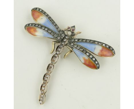 A Russian ruby, diamond and enamel dragonfly brooch,
unmarked gold settings, length 45mm in original box.