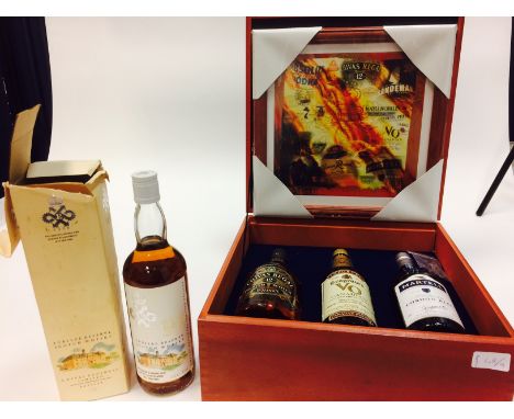 SEAGRAM 1924-2001 GIFT BOX 
To include Chivas Regal 12 Years Old, Seagram's VO Canadian and Martell Cordon Bleu. All 75cl and