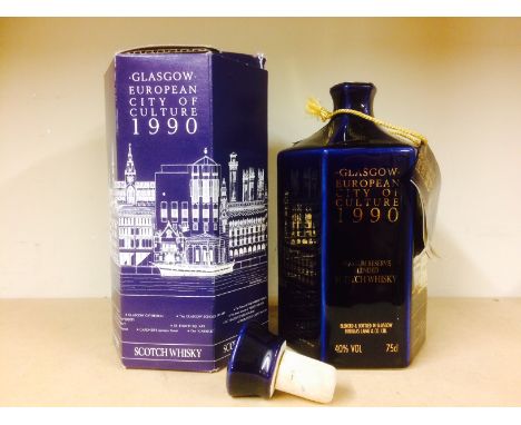 GLASGOW EUROPEAN CITY OF CULTURE 1990 
Blended Scotch Whisky. 
75cl, 40% volume, presented in blue hexagonal ceramic decanter