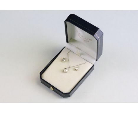 9ct white gold and cultured pearl necklace and earrings jewellery suite. The lot to include a pearl pendant an a white&nbsp; 