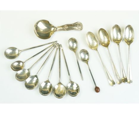 Group of silver hallmarked spoons to include a George III shell pattern caddy spoon (hallmarked Birmingham 1822), four rat ta