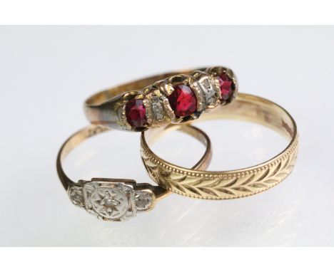 Three 9ct gold rings to include a 9ct and platinum Art Deco ring (size O), red paste three stone ring (hallmarked Chester 189