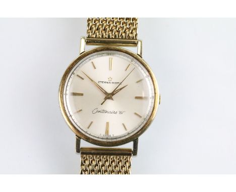 1960s vintage Eterna-matic 'Centenaire 61' wrist watch. The watch having a round face with gilt baton markers to the chapter 