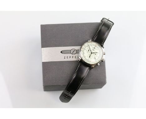 A Zeppelin 100 Jahre gents chronograph wristwatch, three central sub dials and date function to 4 o'clock, mounted to origina