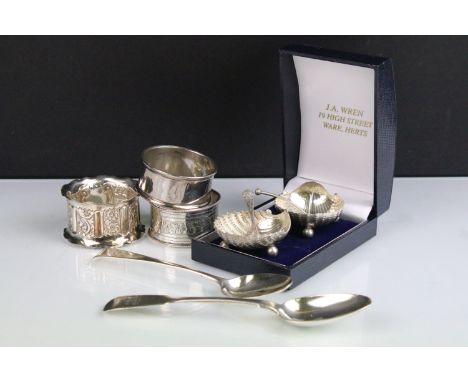 Collection of silver items to include three silver hallmarked napkin rings, a William IV fiddle pattern fork, George III teas