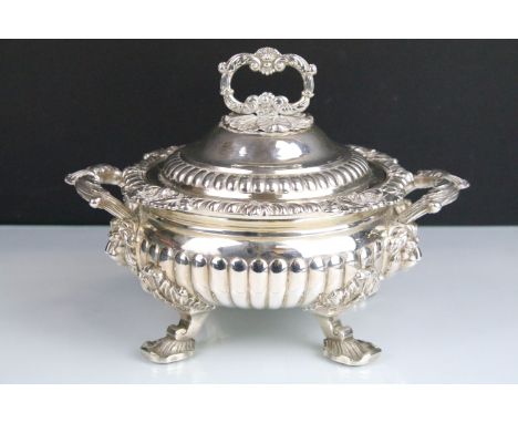 19th Century George III silver hallmarked lidded tureen having moulded gadrooned, shell and foliate detailing raised on four 
