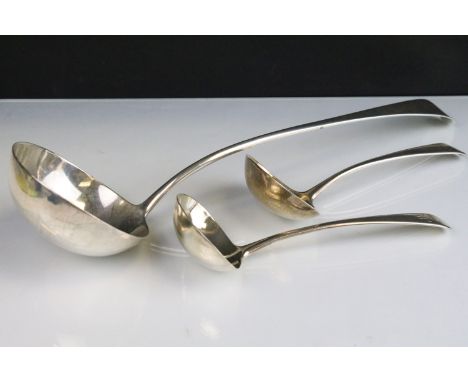 Three 19th Century George III silver ladles to include a large soup ladle with swallow crest to terminal (hallmarked London 1