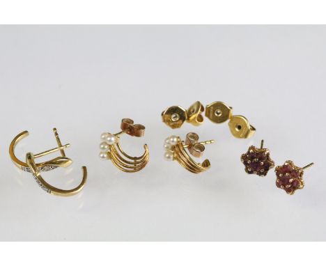 Three pairs of 9ct gold stud earrings to include a pair of red stone cluster earrings, a pair of two tone half hoops set with