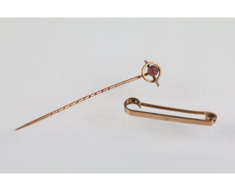 19th Century Victorian 9ct gold stick pin set with a round cut red stone to finial together with a 9ct gold bar brooch (hallm