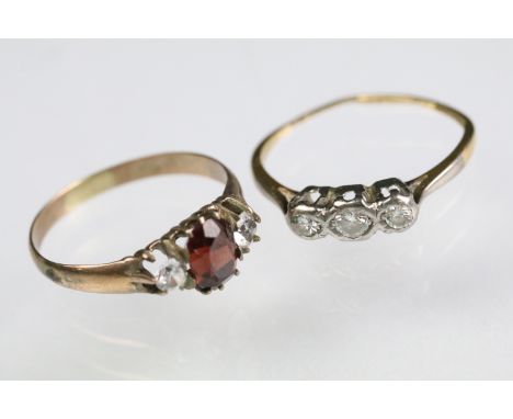 Early 20th Century gold diamond three stone ring (marked 18ct and plat, size J.5), together with a garnet and white stone rin