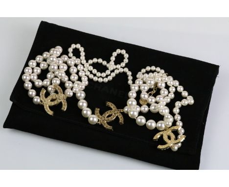 Chanel - simulated pearl CC necklace having gold tone double C's set with pearls with a signed lobster clasp. Clasp signed Ch