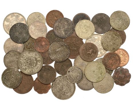 Tibet, Coins of Tibet, in silver (20), base metal (19) [39]. Varied state, one holed £150-£200  ---  Provenance: D.L.F. Sealy