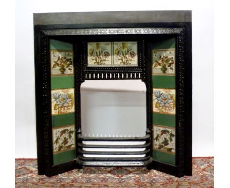A Victorian Cast Iron Fire Surround, inset with pottery tiles, possibly Mintons, 91.5 cms wide x 96 cms high together with a 