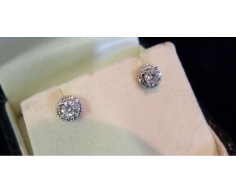 A Pair of 18ct. White Gold Diamond Earrings, approximately 0.41 ct.