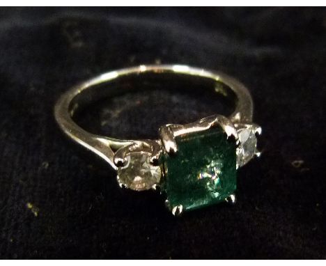 An 18ct. White Gold Emerald and Diamond Ring, emerald approximately 1.48 ct., diamonds approximately 0.34 ct.