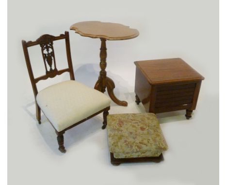 A Victorian Mahogany Occasional Table, the shaped top above turned centre column raised upon tripartite legs with scroll feet