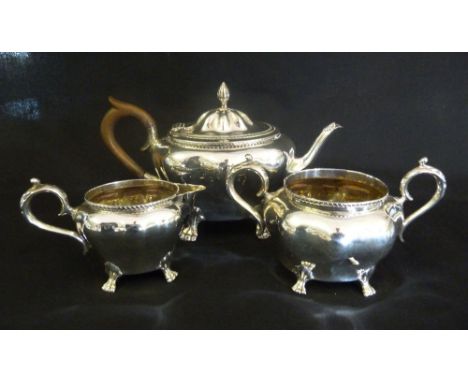 A Birmingham Silver Three Piece Tea Service, comprising teapot, sucrier and cream jug, 16 ozs.