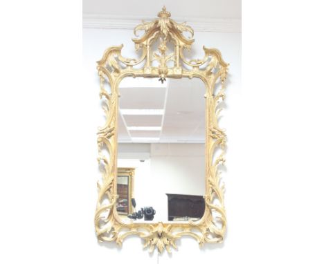A George III style carved and gilded wall mirror in the Chinese Chippendale style with pagoda top and leaf scroll frame to a 