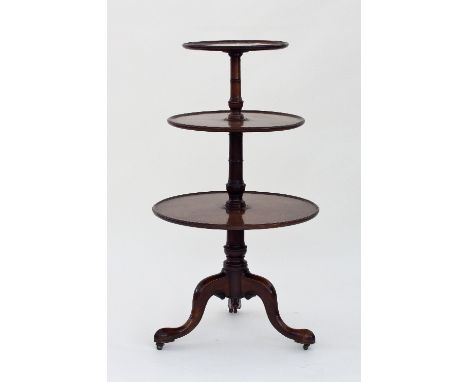 A George III mahogany three-tier dumb waiter, on turned columns and cabriole legs, 113cm high/see illustration Condition Repo