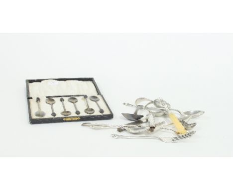 A George IV silver caddy spoon, a set of six coffee spoons with bean terminals and sundry silver flatware