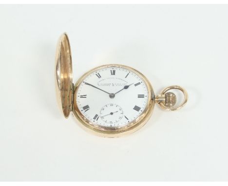 A 9ct gold cased hunter pocket watch, the white enamel dial with Roman numerals and subsidiary seconds dial, signed Makers to