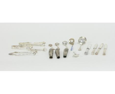A pair of 18th Century bright cut silver sugar nips, WC, with spring mechanism, another pair, Peter & Ann Bateman, London 179