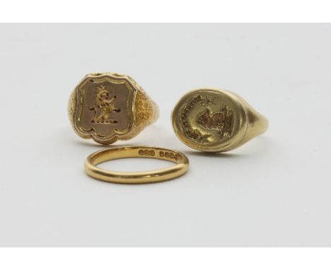 A 19th Century 18ct gold signet ring, with concealed vacant compartment, the hinged lid of shield shape engraved with the Eva