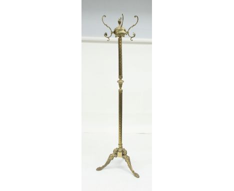 A brass coat and hat stand on a tripod base, 170cm high