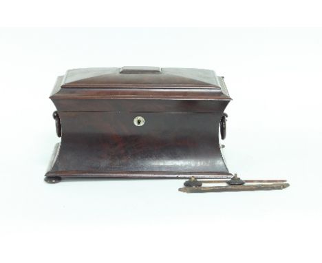 A Regency mahogany sarcophagus shaped tea caddy, 37cm wide