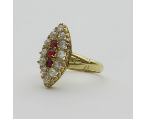 A ruby and diamond ring of navette shape, set in 18ct gold, ring size M