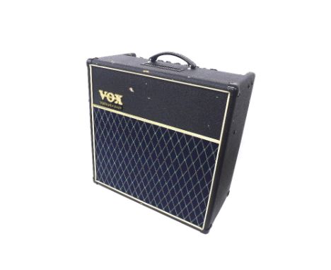 Vox Valvetronix AD60VT guitar amplifier in need of servicing (slightly distorting at low gain levels); together with a Vox Va