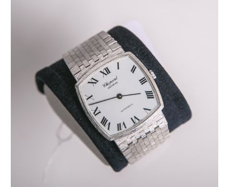Herrenarmbanduhr "Chopard" 750 WG (1970er Jahre), Automatik, weißes Zifferblatt m. röm.Zahlen in Schwarz, Ref. 152131-1001, S